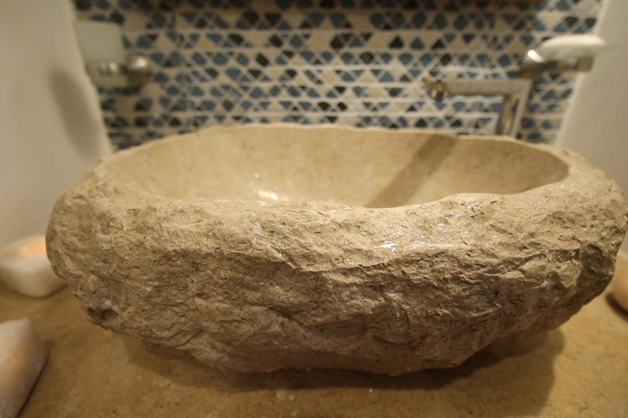 Benben By Dhara Hotels - Adults Only أسوان المظهر الخارجي الصورة A stone sink