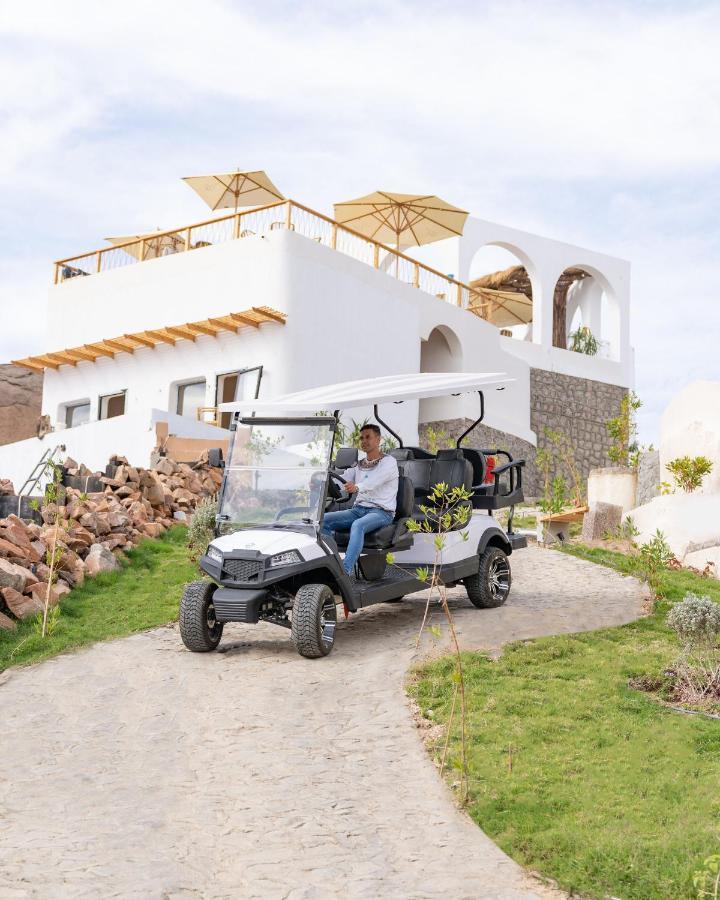 Benben By Dhara Hotels - Adults Only أسوان المظهر الخارجي الصورة Club Car Villager
